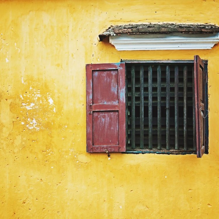 Latest Sale interior design, old yellow wall, red window frame